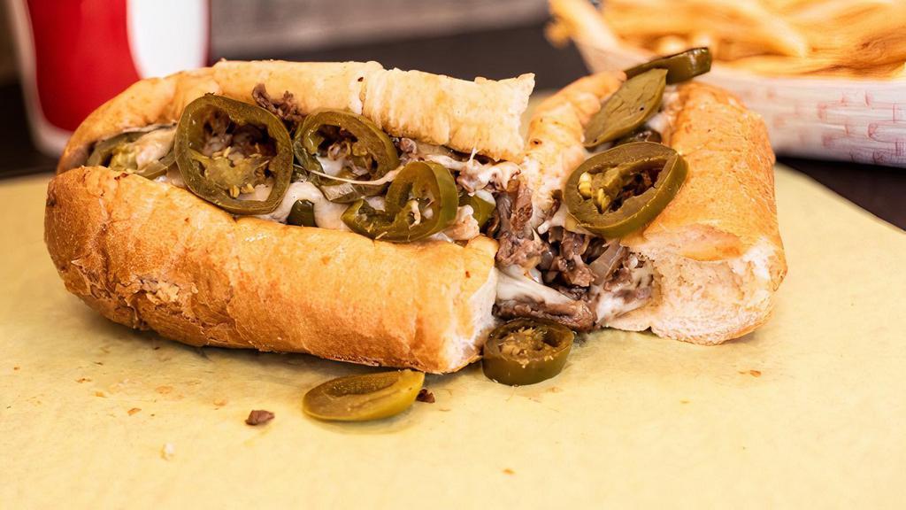 Dragon Philly · Fire hot jalapenos, steak with melted cheese and sauteed onions.