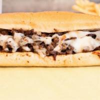 Twin City · Tasty marinated steak w/ grilled onions & cheese.