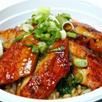 Unagi Bowl · Roasted BBQ eel over sushi or brown rice with teriyaki sauce topped with seaweed salad and g...