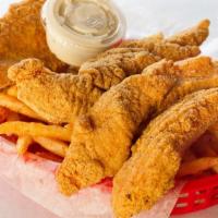 Fried Catfish Basket · Four fillets of catfish hand-tossed in our homemade batter and fried to perfection. Served w...