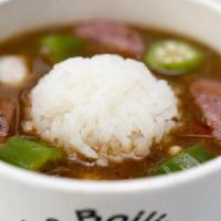Gumbo with Rice (Cup) · Traditional gumbo with jasmine rice, okra, celery, bell pepper, crab, sausage, and shrimp. T...