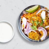 Is There Biryani-body Out There? · Spiced seasoned vegetables cooked with Indian spices and basmati rice. Served with house rai...