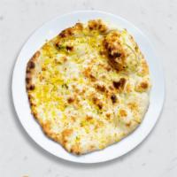 Naan Can Stop Us  · Oven lovin' with freshly baked bread in a clay oven