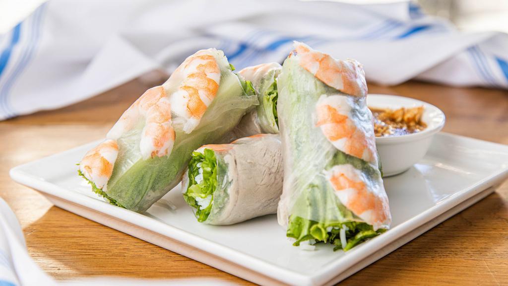 Spring Rolls · Shrimp, pork belly, vermicelli noodle, and fresh herbs. Served with house peanut dipping sauce. Four pieces.