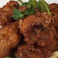 Fried Chicken · Crispy chicken  dips in sweet and tangy house special tamarind sauce.