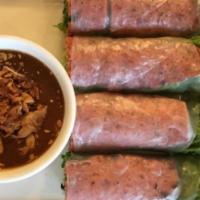 Pork Patties Rolls · Grilled pork patties, vermicelli noodles, and fresh herbs. Served with house peanut dipping ...