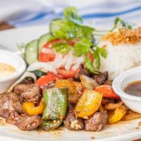 Shaken Beef · Favorite item. Cubes of filet mignon wok tossed with bell peppers and onions. Served with sp...