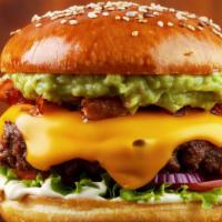 South Burger · 1/2 lb. niman ranch beef, topped with homemade spicy guacamole, jalapeno mayo, lettuce and p...