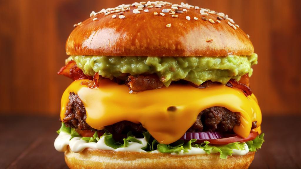 South Burger · 1/2 lb. niman ranch beef, topped with homemade spicy guacamole, jalapeno mayo, lettuce and pepper jack cheese.