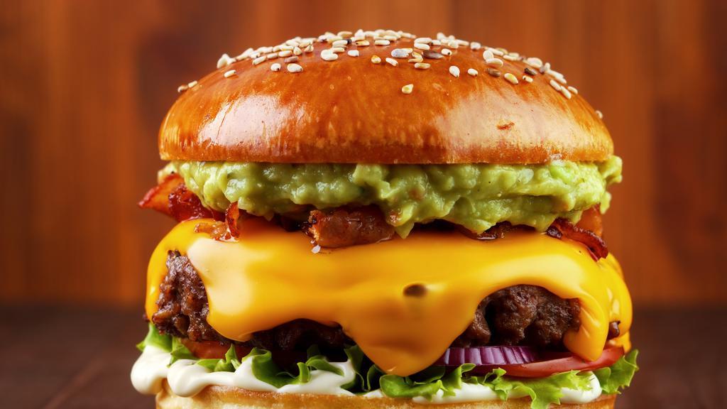 South Burger · Beef, topped with homemade spicy guacamole, jalapeno mayo, lettuce and pepper jack cheese.