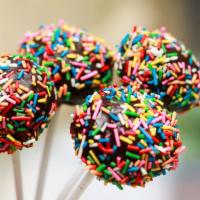 Cake Pops · Fresh baked round, cake pops, the whole cake pops is cake, covered in white, milk or dark ch...
