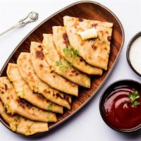 Paneer Naan · Cottage cheese stuffed with herbs.