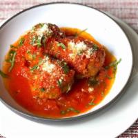 Polpette Al Sugo · Beef meatball, tomato sauce, parmigiano,