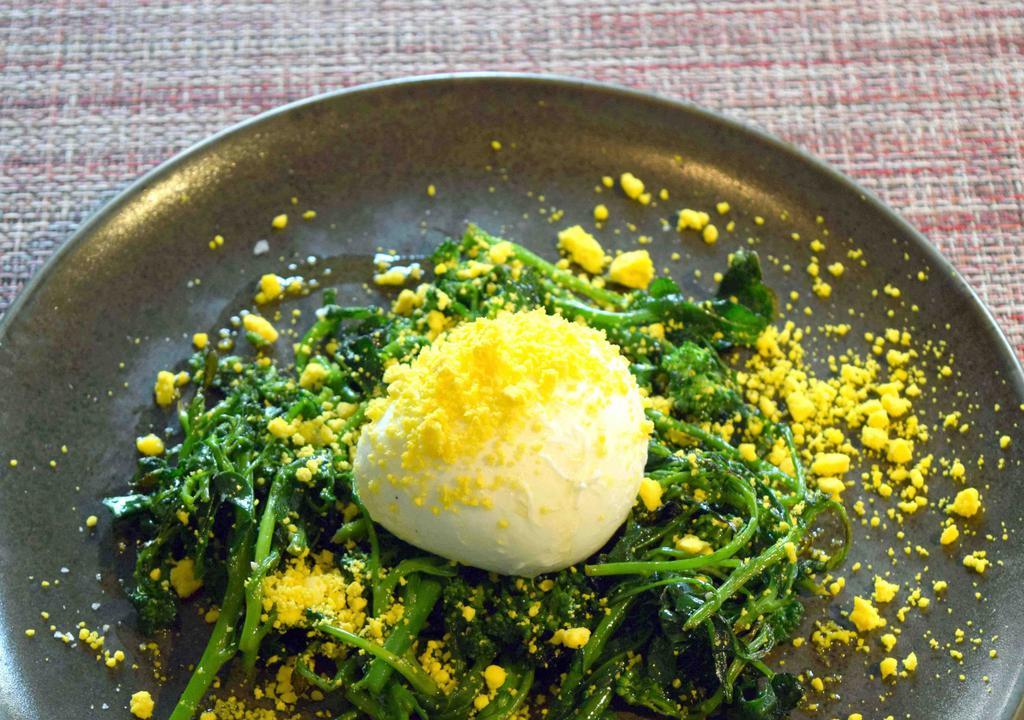 Burrata con Broccolini (vegetarian) · Local burrata, grilled broccolini, grated hard boiled egg yolk.