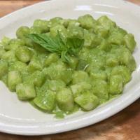Gnocchi al Pesto ( Vegetarian) · Housemade potato gnocchi, traditional basil pesto, parmigiano
