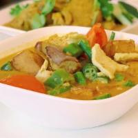 N4. Curry Mee Aka Curry Noodle · Curey-based soup coconut milk cumy leal, lemon grass shallots bean sprouts tofu puff, okra, ...