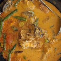 E27. Curry Seafood (claypot). · Fish fillet, shrimp, squid, vegetables