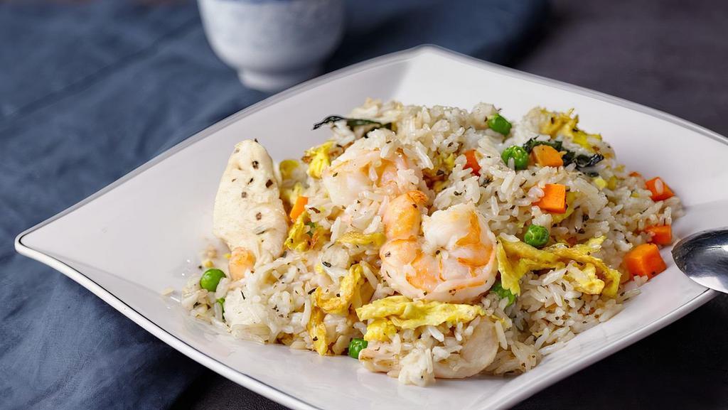 R12. Indian Nasi Goreng (Indian Fried Rice) · Shrimps, chicken, tofu, eggs, choy sum, tomatoes, carrots, peas, potatoes