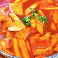 Tteokbokki (Spicy🌶🌶) · A popular  Korean dish made with rice cake and fish cake boiled in spicy sauce