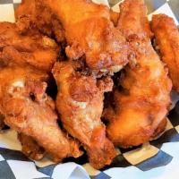 Crispy Fried Chicken Wings · Extra battered, twice fried.