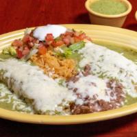 Enchiladas Plate · Two enchiladas smothered in our red enchilada sauce and stuff with cheese, beef or chicken.