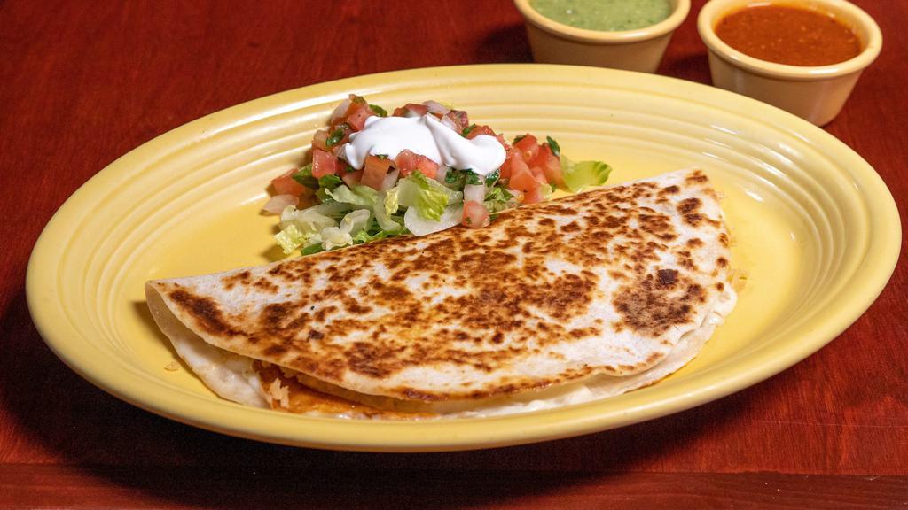 Super Quesadilla · A grilled flour tortilla with melted cheese, your choice of meat, salsa, guacamole and sour cream