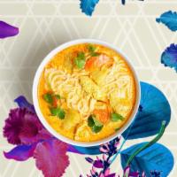 Mango Curry · Chicken, fresh mango, bell pepper, and basil in red curry sauce. Served with steamed jasmine...