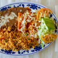 Enchiladas · Chicken or cheese(3)Topped with our especial enchilada sauce and monterrey cheese. Refried B...
