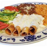 Flautas · Fried chicken taquitos(4) topped with cheese and sour cream. Served with refried beans,rice ...