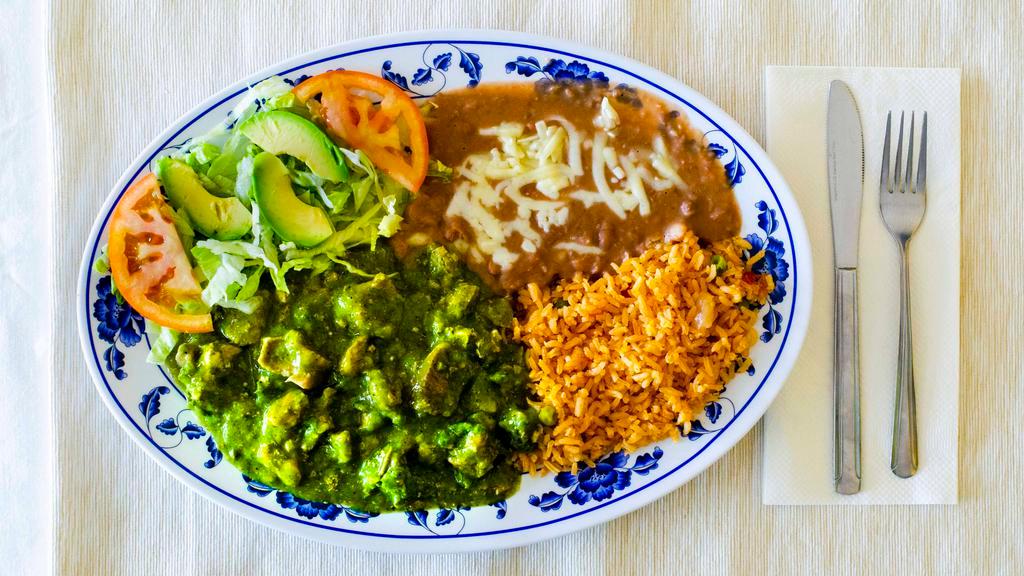 Chile Verde · Tender cut pork in our special green chili sauce.
Refried beans,rice and salad on the side. Your choice of corn or flour tortillas