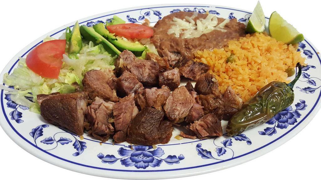 Orden de Carnitas · Fried pork tender meat served with grilled onions and jalapeno, refried beans,rice, salad and your choice of corn or flour tortillas