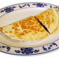 Regular Quesadilla · Monterrey Cheese and meat only.