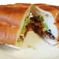 Tortas · Choice of meat, tomato, lettuce, avocado and sour cream.