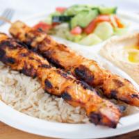 Chicken Kabob Plate · Chicken kabob plate served with side of rice, hummus, greek salad, and fresh pita bread alon...