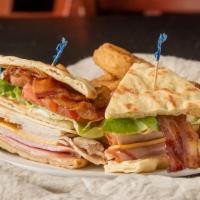 Club Sandwich · Sliced turkey, sliced ham, mayonnaise, lettuce, tomatoes, bacon, American and Swiss cheese. ...