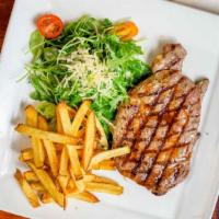 Ribeye Steak · 12 oz. CAB Ribeye steak, mashed potatoes, charred broccolini, young carrots, roquefort compo...