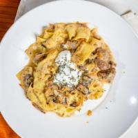 Filet Stroganoff · Handmade fresh pasta, filet mignon tips, mushrooms, shallots, brandy cream