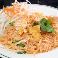 Pad Thai · Stir-fried small rice noodle, shrimp or chicken, dried shrimp, egg, crush peanut, tofu, and ...
