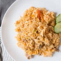 Thai Style Fried Rice · Thai style fried rice with your choice of meat, egg, white onions, green onions, topped with...