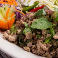 Larb · Your choice of ground chicken, ground pork, or ground beef tossed with red onion, green onio...