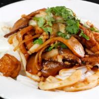 Guay Tiew Lord · Steamed flat rice noodle and bean sprout tossed with homemade soy sauce, garnished with shri...