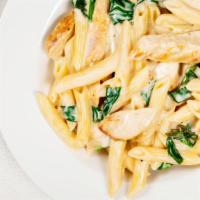 Alfredo Chicken Pasta · Hearty grilled chicken and house made creamy alfredo sauce served over a bed of fresh pasta.