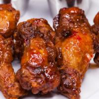 BBQ Wings · Fresh chicken wings smothered in BBQ house made sauce.