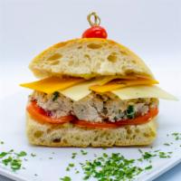 Grand Mama' Tuna Melt · Ciabatta Bread with Grandma' recipe Tuna Salad topped with melted Cheddar and Swiss Cheese a...