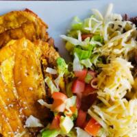 Loaded Patacones · Fried Plantain  with the choice of chicken ,beef or pork with Gouda cheese and picadito on top