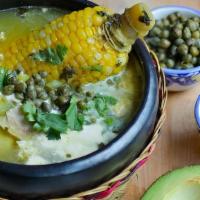 Ajiaco Soup · Traditional Colombian soup made from three different kinds of potatoes , chicken, guasca lea...