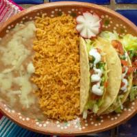 Crispy Taco Plate · 2 hard shelled tacos, your choice of meat, lettuce, sour cream, Pico de Gallo and cheese. Wi...