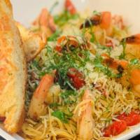 Seafood Pomodoro Pasta · Prawns, angel hair pasta, tomato, olive oil, and basil.