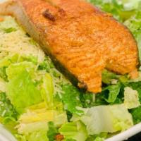 Salmon Caesar salad · Hearts of romaine, croutons ,Parmesan cheese