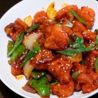 Gobi Manchurian · Cauliflower florets marinated with Indo-Chinese spices and pan tossed with bell peppers.